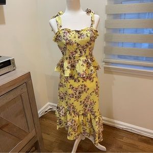 Yellow floral print Sofia Vergara two piece set skirt and corset style top